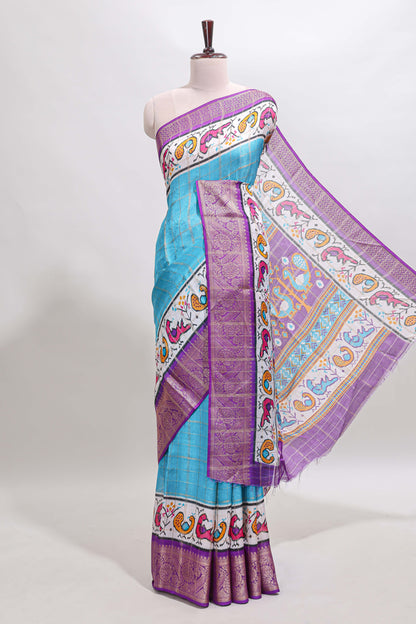Blue checked dola silk saree with contrast zari border and blouse