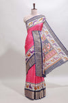Pink checked dola silk saree with contrast zari border and blouse