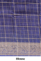 Pink checked dola silk saree with contrast zari border and blouse