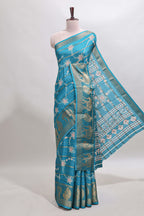 Midnight green striped floral vine dola silk saree with self zari border and matching blouse