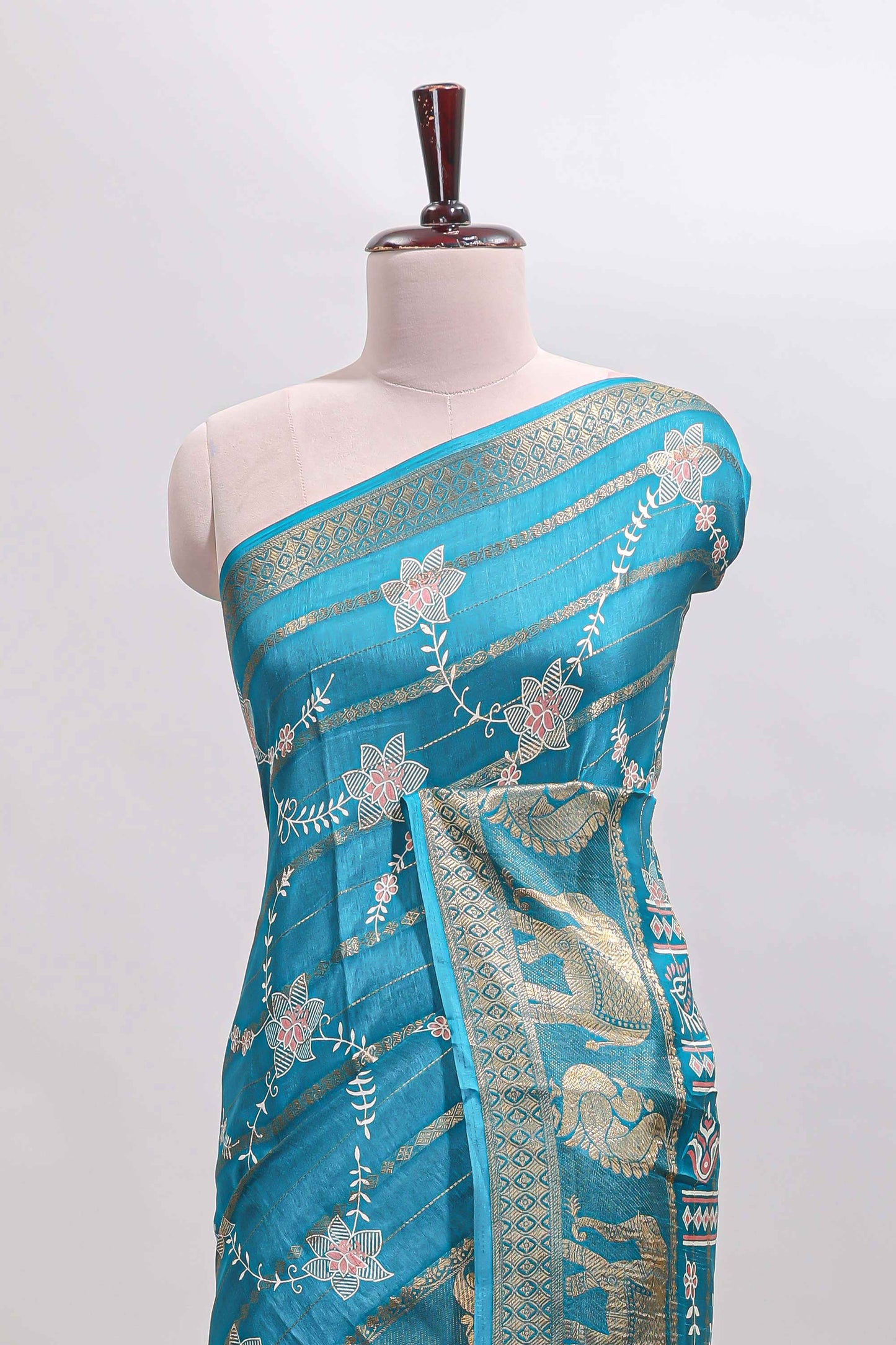 Midnight green striped floral vine dola silk saree with self zari border and matching blouse