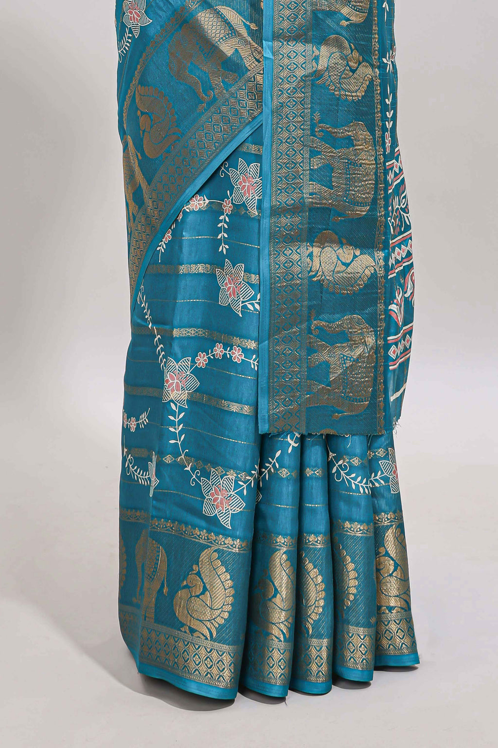 Midnight green striped floral vine dola silk saree with self zari border and matching blouse