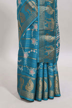 Midnight green striped floral vine dola silk saree with self zari border and matching blouse