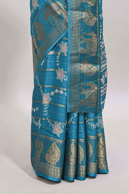 Midnight green striped floral vine dola silk saree with self zari border and matching blouse