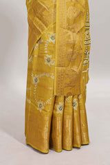 Yellow striped floral vine dola silk saree with self zari border and matching blouse