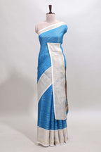 Blue zari striped dola silk saree with contrast zari border and printed blouse