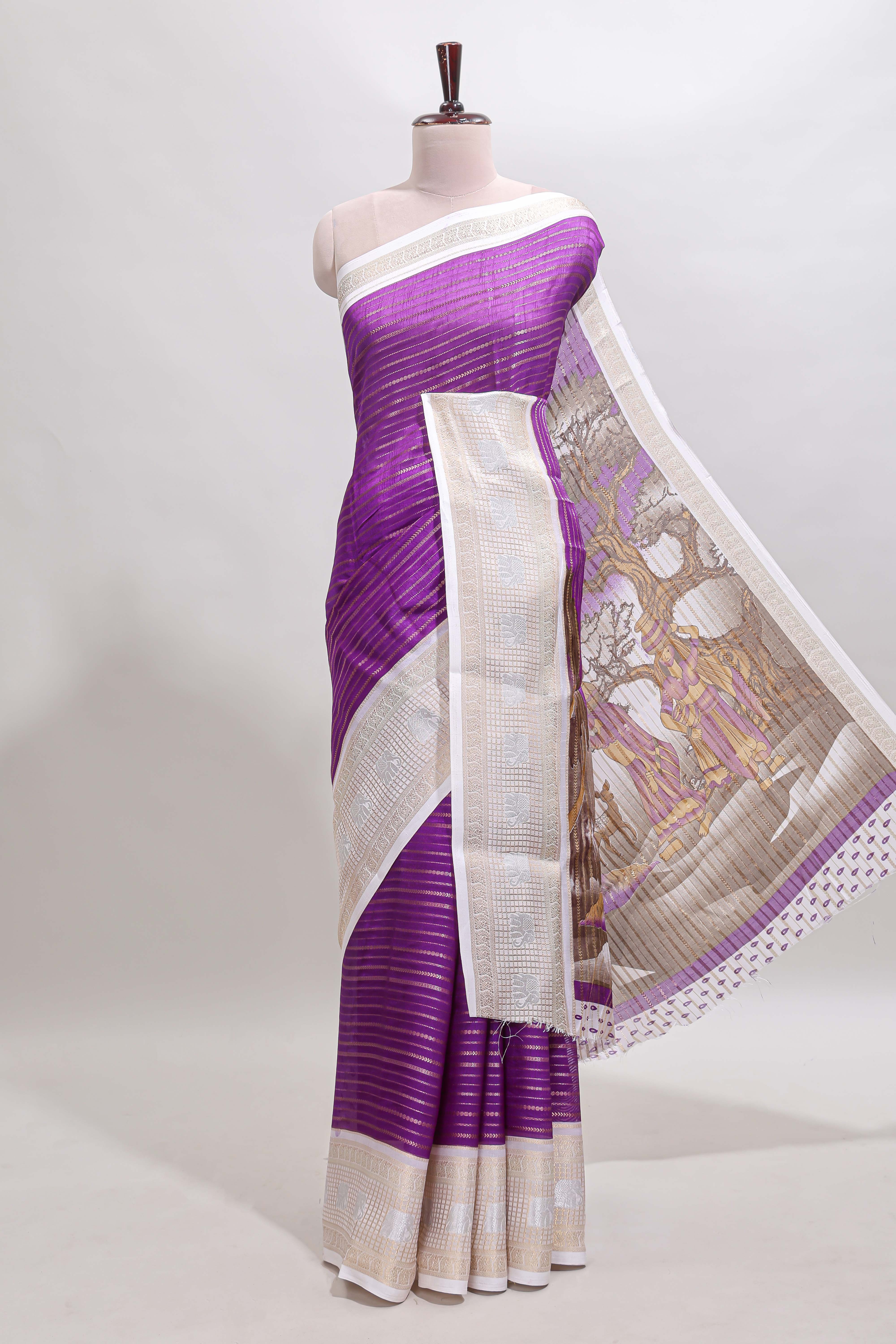 Violet zari striped dola silk saree withcontrast zari border and printed blouse