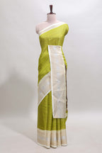 Green zari striped dola silk saree with  contrast zari border and printed blouse
