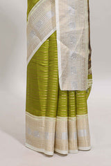 Green zari striped dola silk saree withcontrast zari border and printed blouse