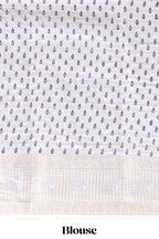 Dark blue zari striped dola silk saree with  contrast zari border and printed blouse