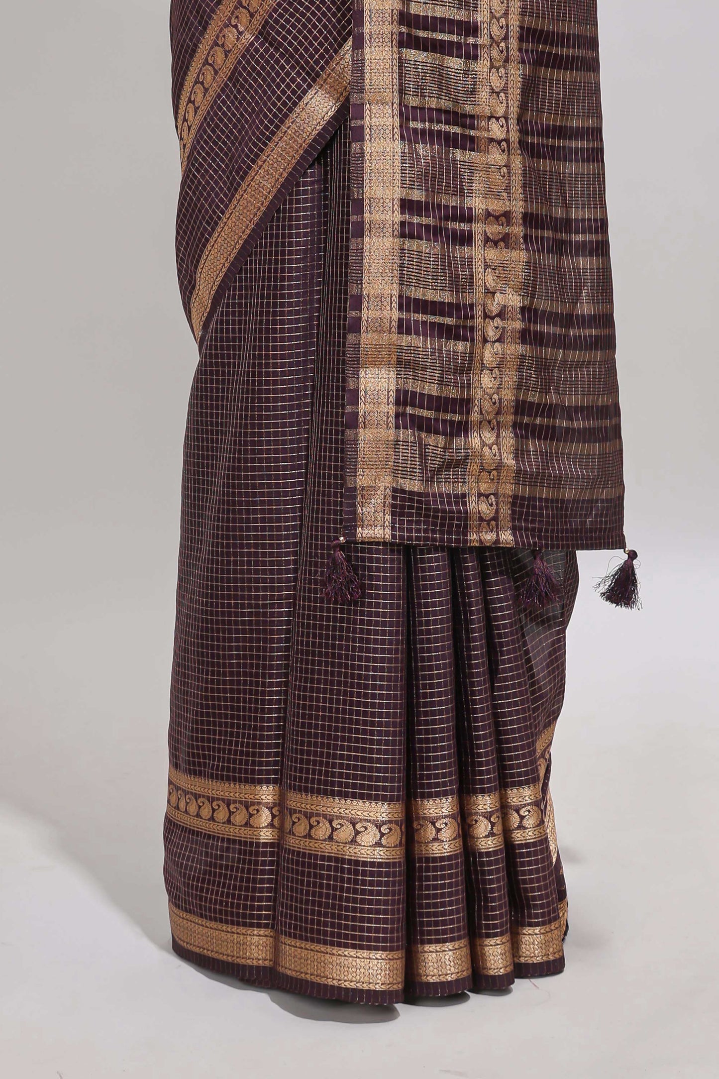 Brown checked dola silk saree with self zari border and matching striped pallu