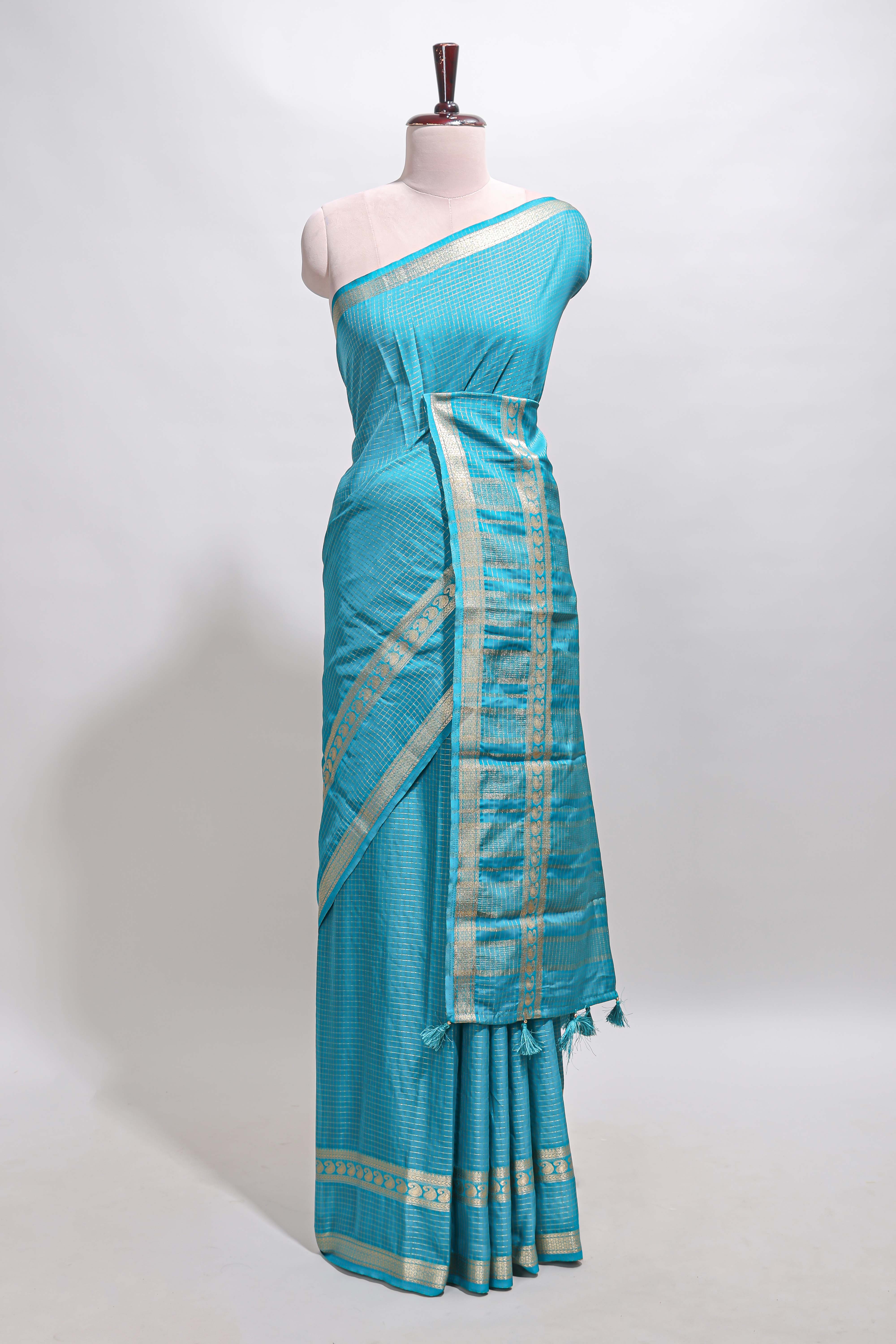 Blue checked dola silk saree with self zari border and matching striped pallu