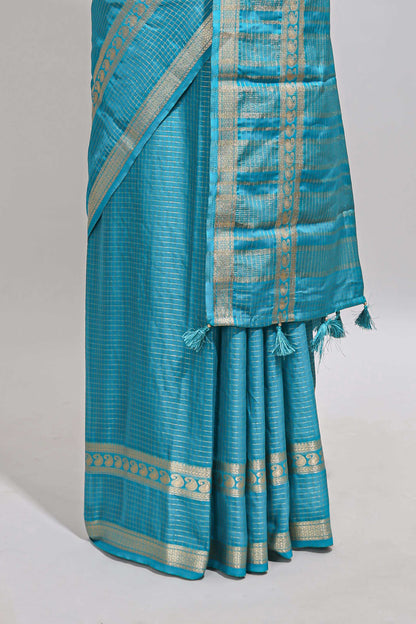 Blue checked dola silk saree with self zari border and matching striped pallu