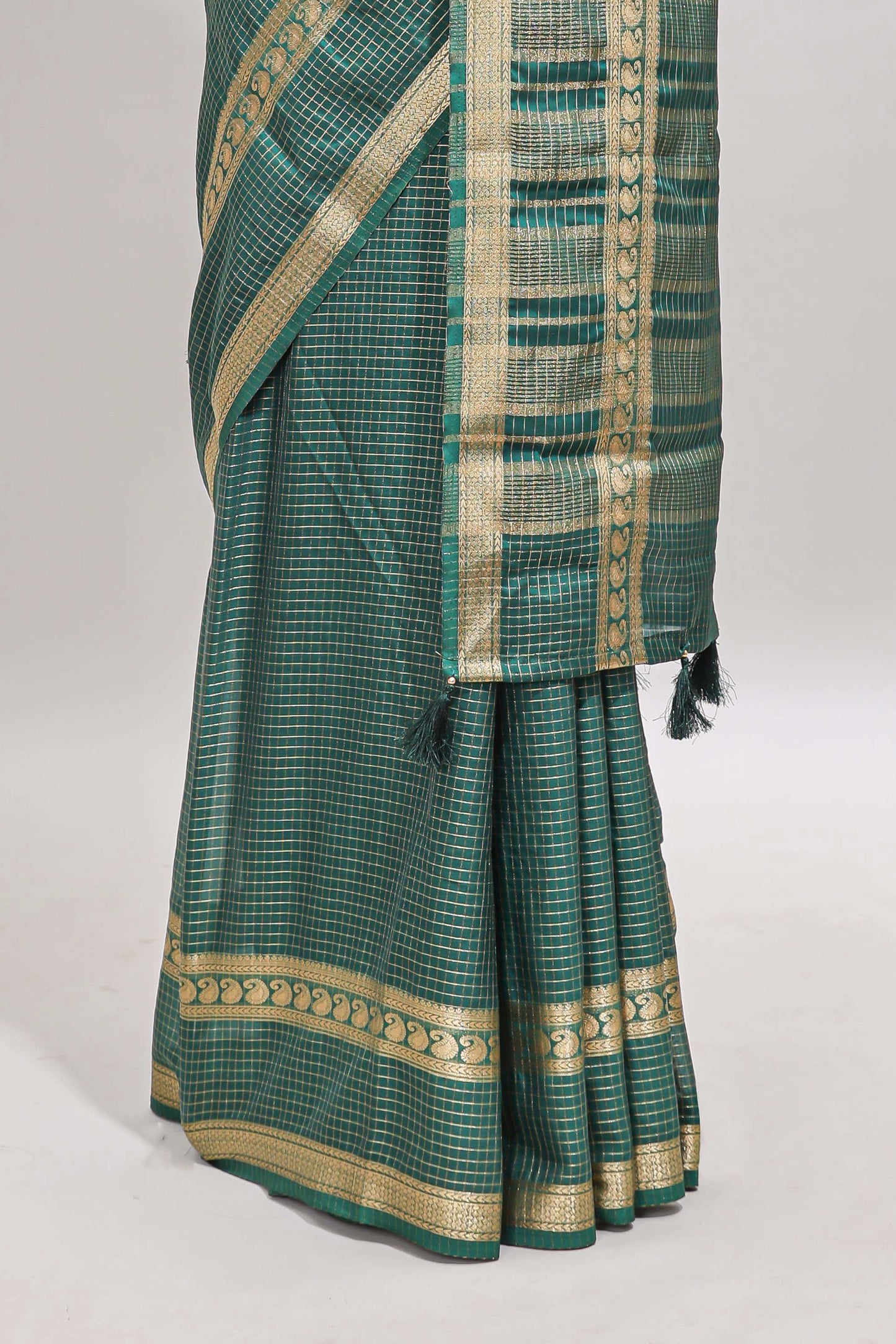Green checked dola silk saree with self zari border and matching striped pallu