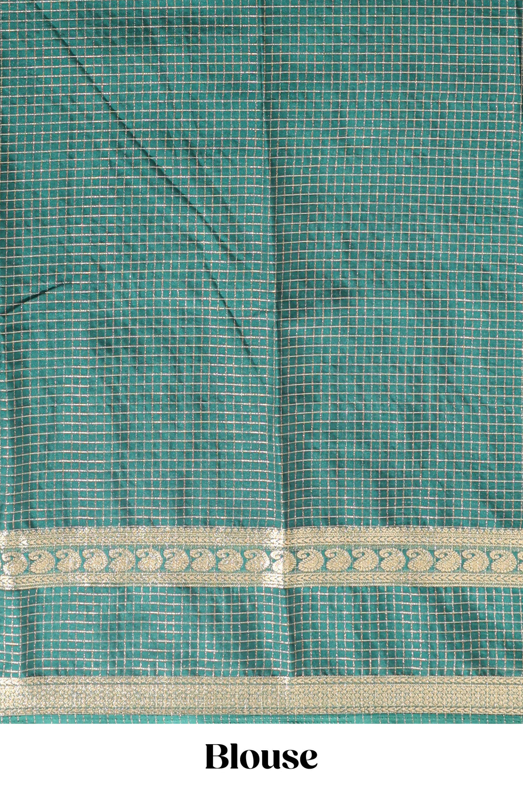 Green checked dola silk saree with self zari border and matching striped pallu