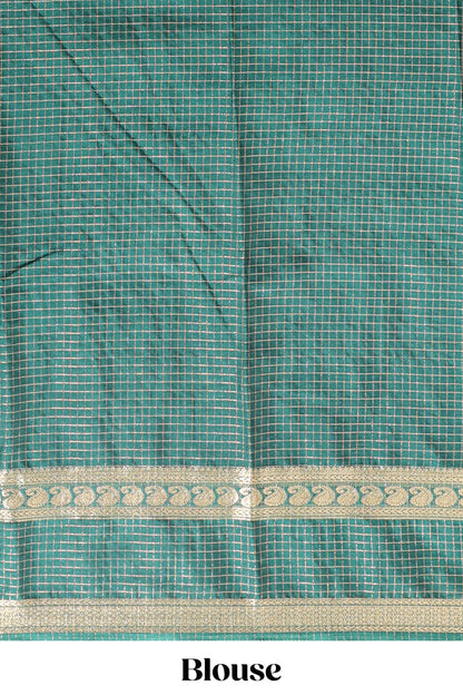 Green checked dola silk saree with self zari border and matching striped pallu