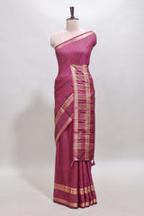 Magenta checked dola silk saree with self zari border and matching striped pallu