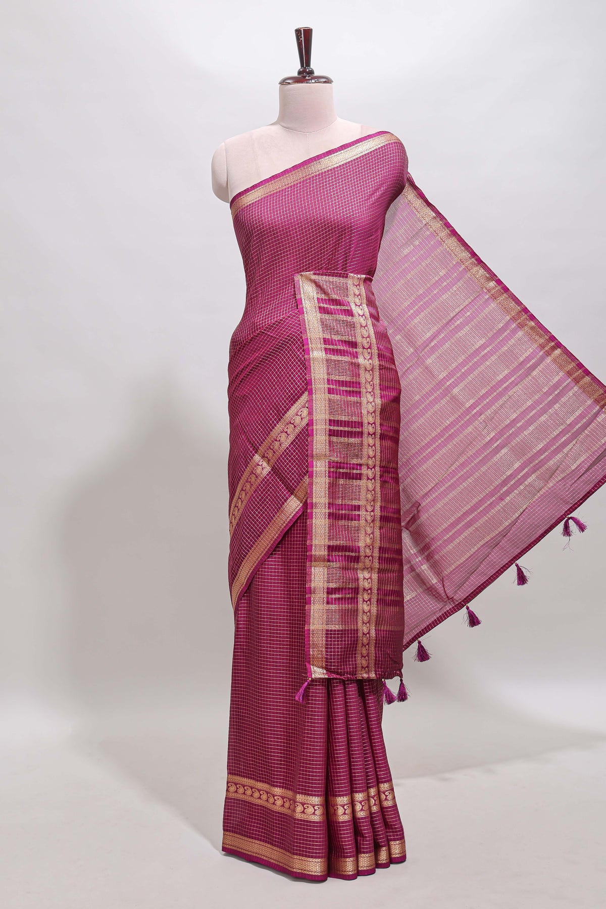 Magenta checked dola silk saree with self zari border and matching striped pallu