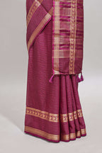 Magenta checked dola silk saree with self zari border and matching striped pallu