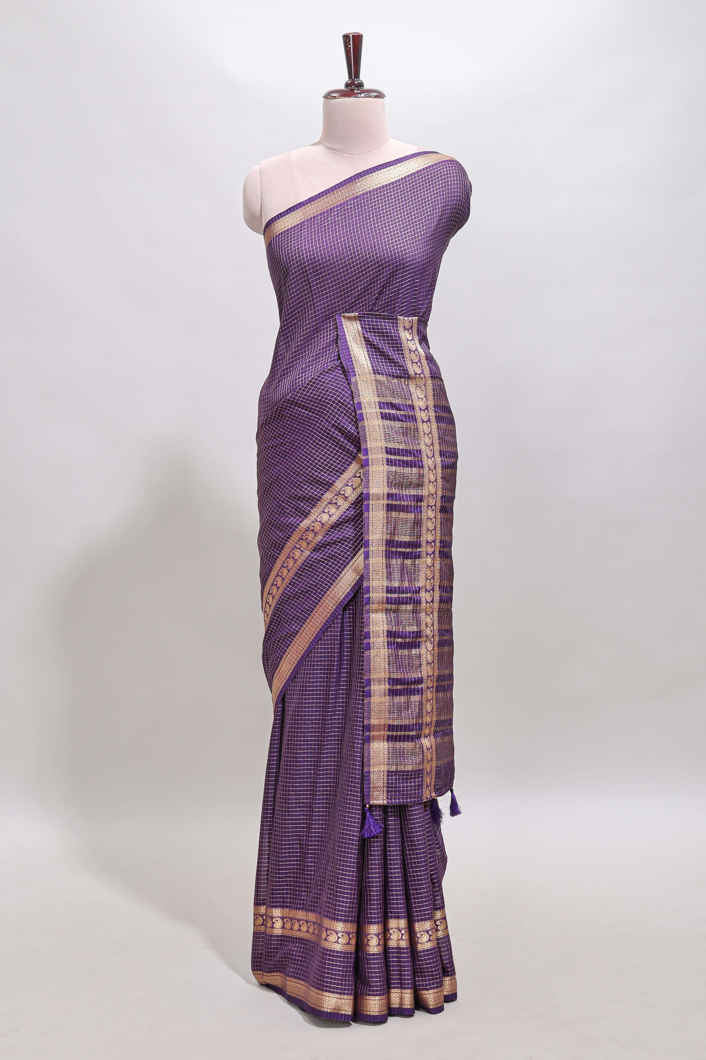 Violet checked dola silk saree with self zari border and matching striped pallu