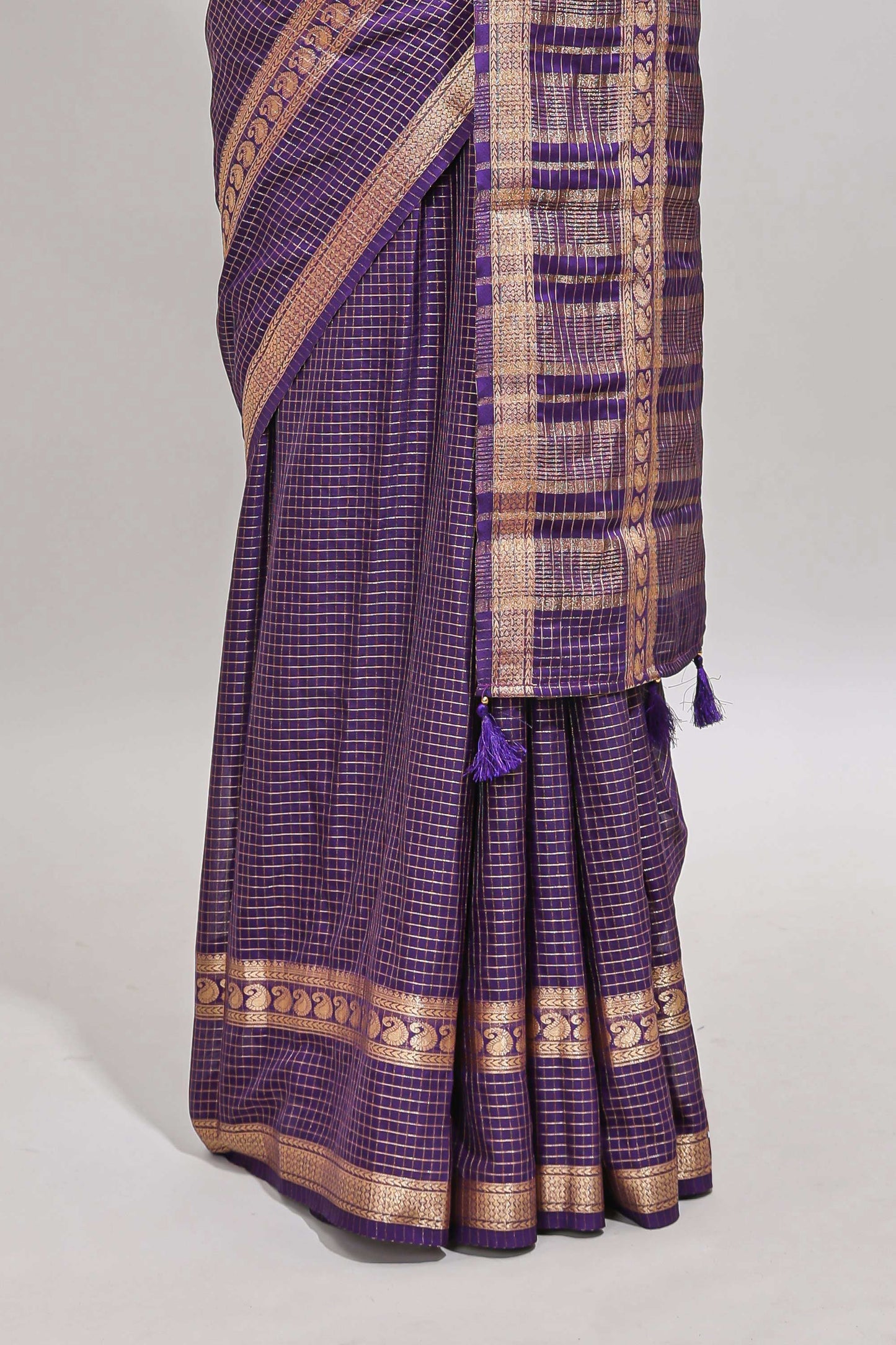 Violet checked dola silk saree with self zari border and matching striped pallu
