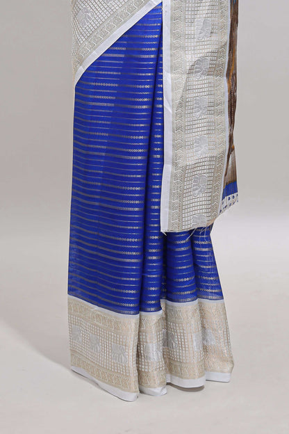 Blue striped dola silk saree with contrast zari border and kalamkari style pallu