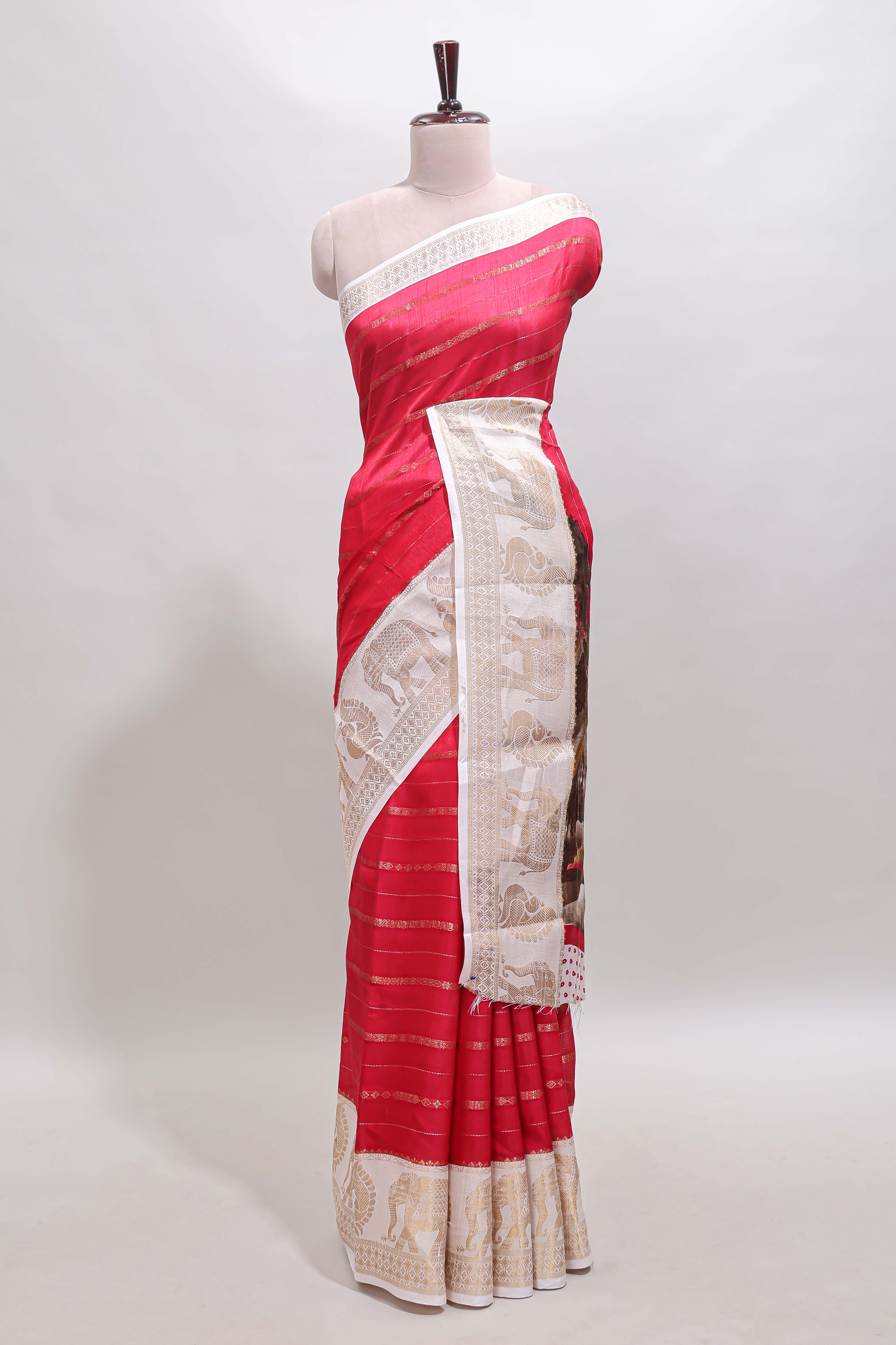 Pink striped dola silk saree with contrast zari border and kalamkari style pallu
