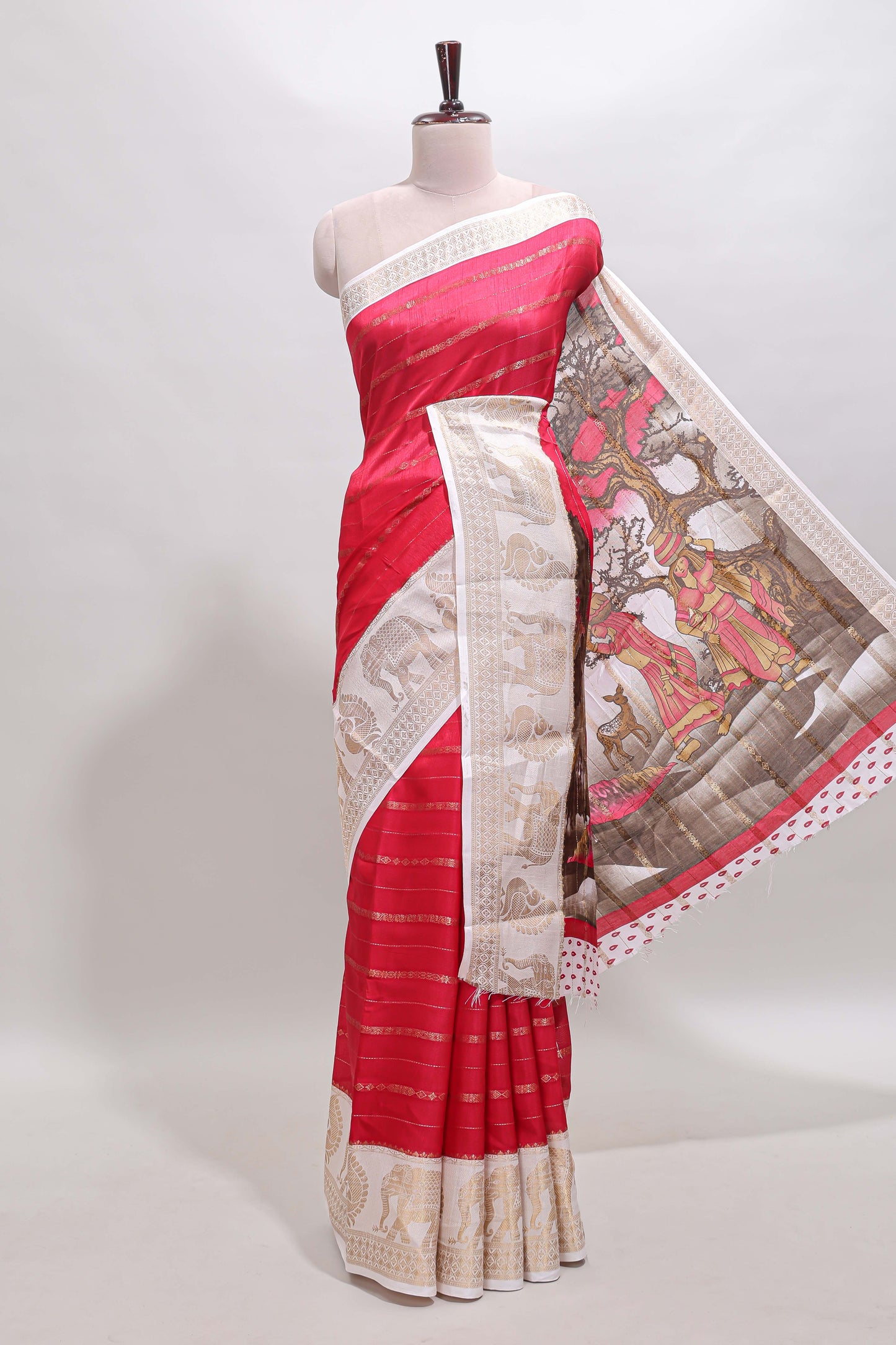 Pink striped dola silk saree with contrast zari border and kalamkari style pallu