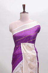 Violet striped dola silk saree with contrast zari border and kalamkari style pallu