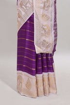 Violet striped dola silk saree with contrast zari border and kalamkari style pallu