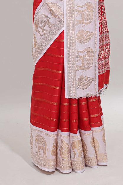 Red striped dola silk saree with contrast zari border and kalamkari style pallu