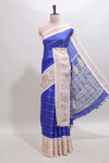 Blue striped dola silk saree with contrast zari border and kalamkari style pallu