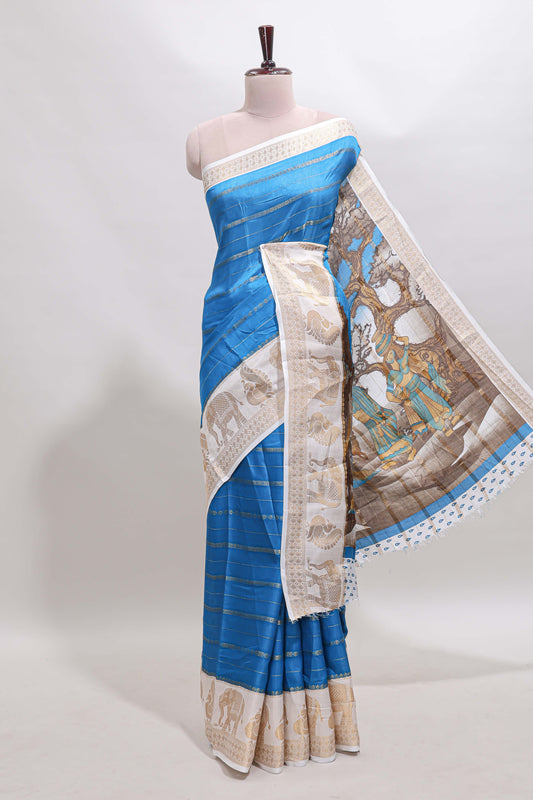 Peacock blue striped dola silk saree with contrast zari border and kalamkari style pallu