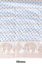 Peacock blue striped dola silk saree with contrast zari border and kalamkari style pallu