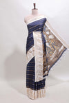 Dark blue striped dola silk saree with contrast zari border and kalamkari style pallu