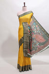Mustard striped dola silk saree with contrast zari border and peacock & floral design pallu