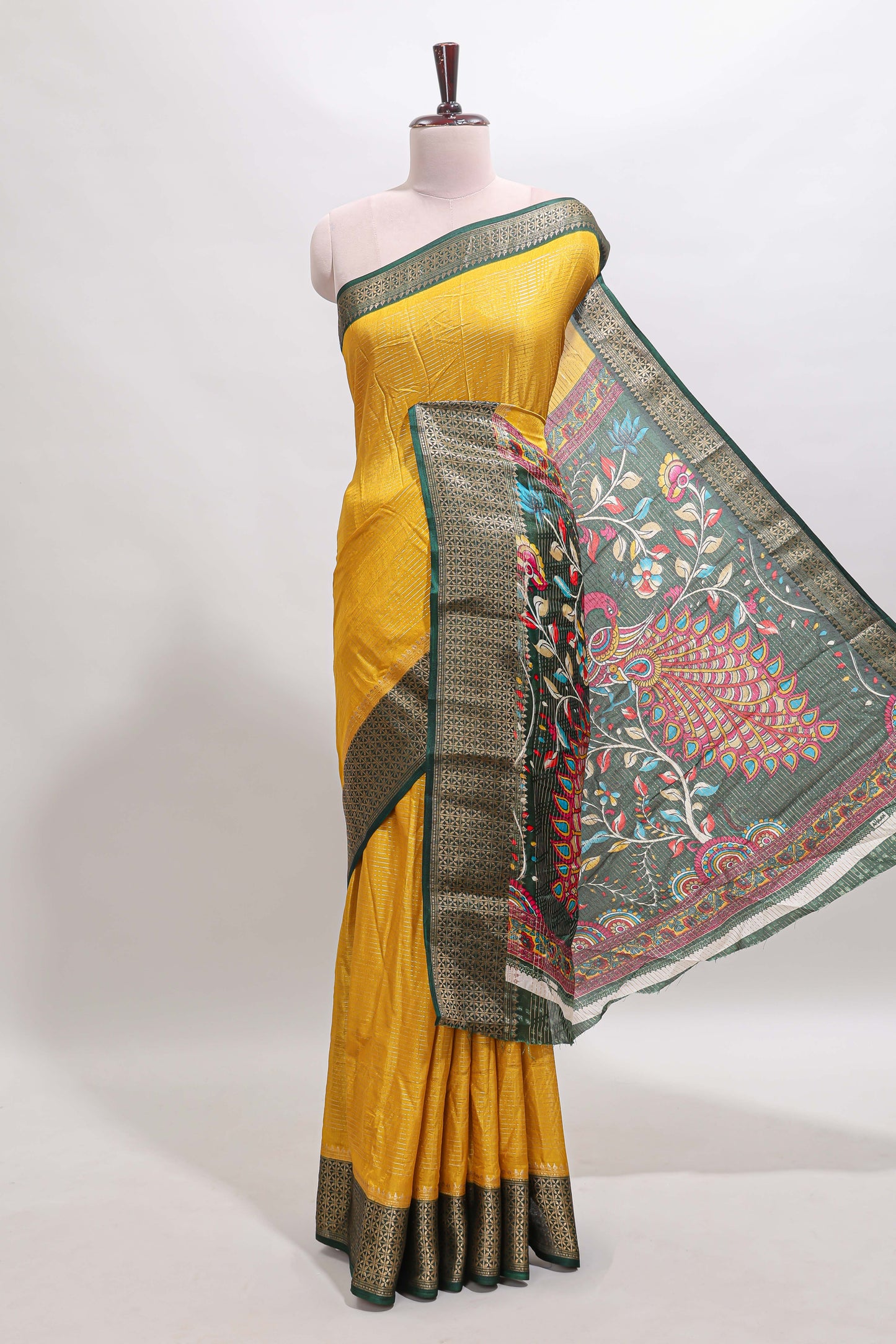 Mustard striped dola silk saree with contrast zari border and peacock & floral design pallu