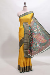 Mustard striped dola silk saree with contrast zari border and peacock & floral design pallu