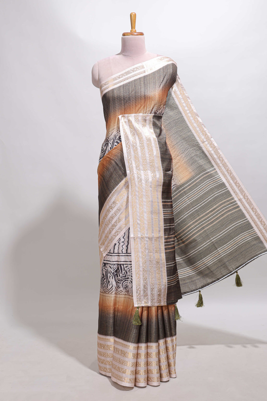 Grey geometric design dola silk saree with  contrast zari border and matching blouse