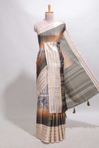 Grey geometric design dola silk saree with  contrast zari border and matching blouse