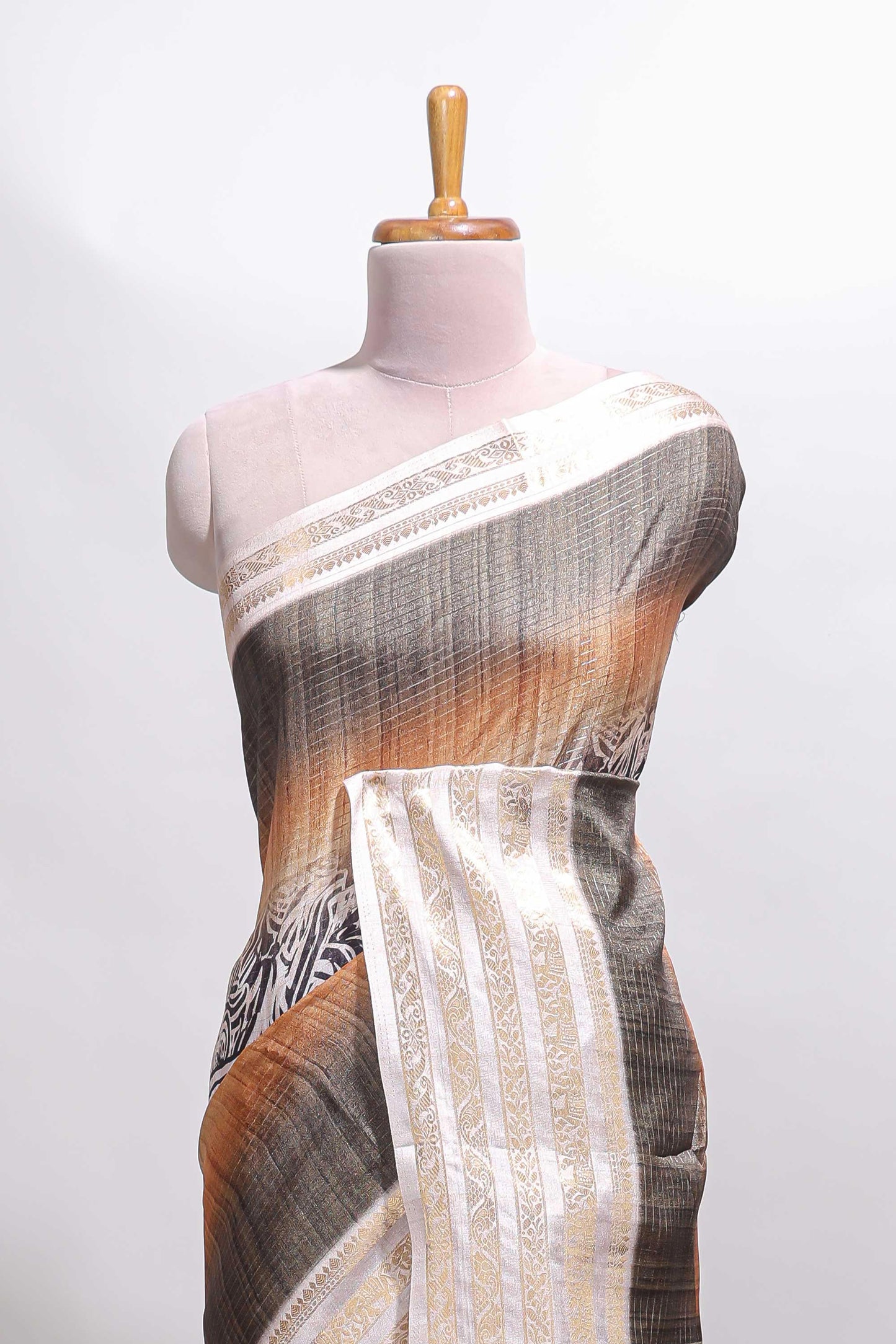 Grey geometric design dola silk saree with  contrast zari border and matching blouse