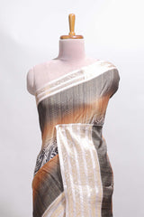 Grey geometric design dola silk saree withcontrast zari border and matching blouse