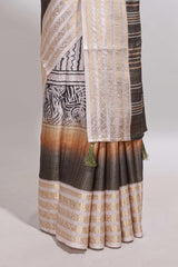 Grey geometric design dola silk saree withcontrast zari border and matching blouse