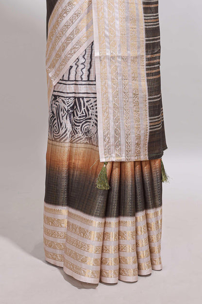 Grey geometric design dola silk saree with  contrast zari border and matching blouse