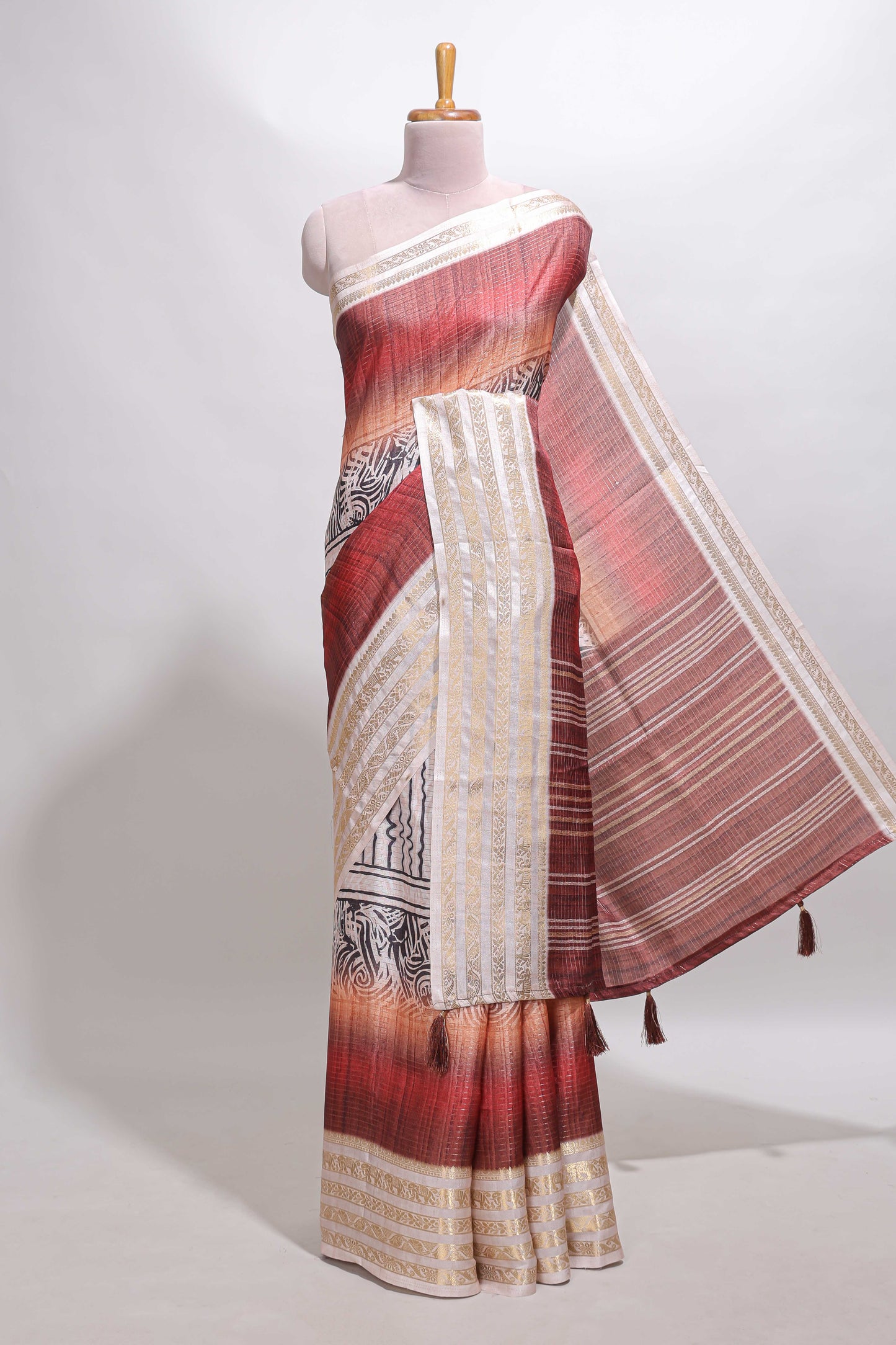 Plum red geometric design dola silk saree with  contrast zari border and matching blouse