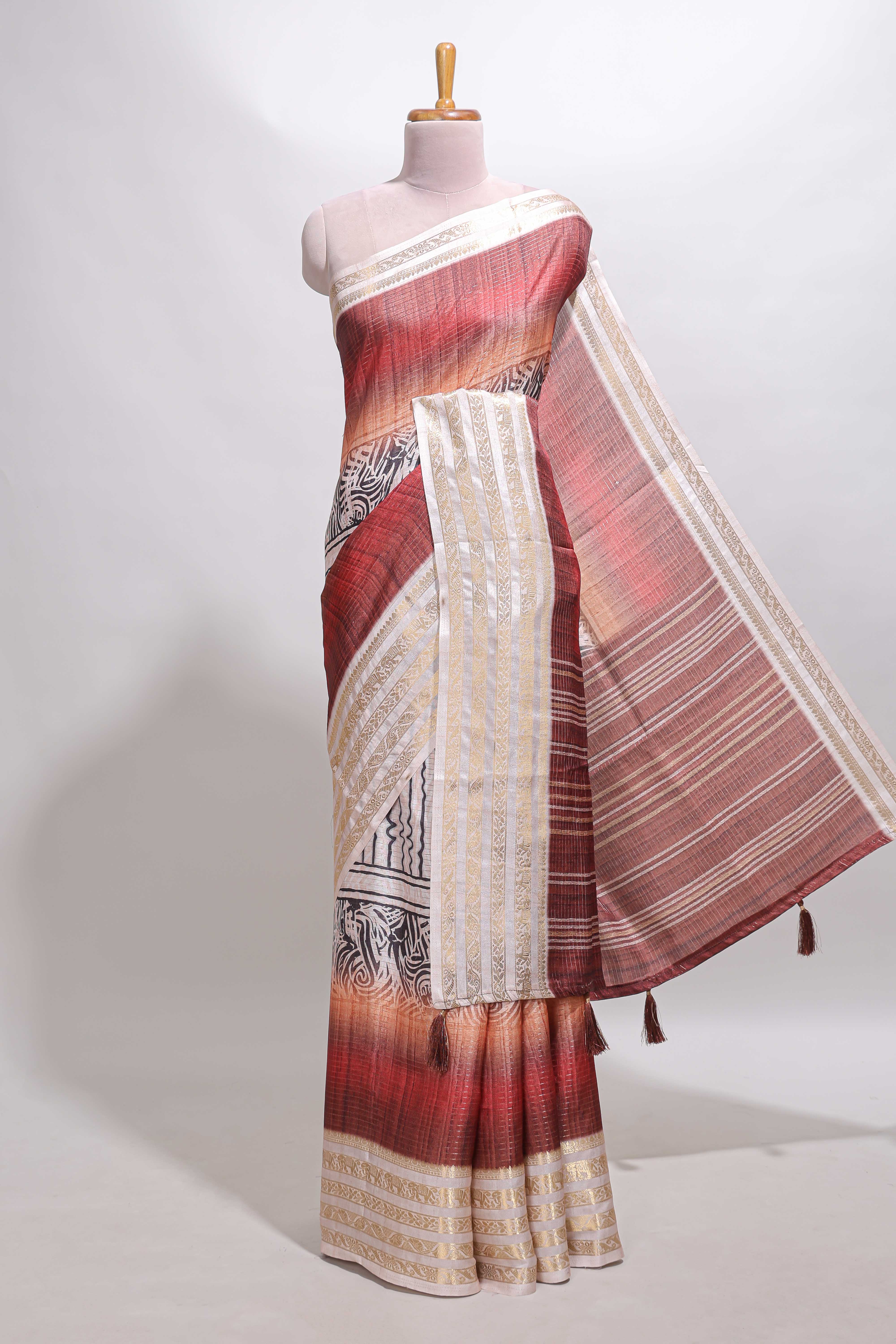 Plum red geometric design dola silk saree withcontrast zari border and matching blouse