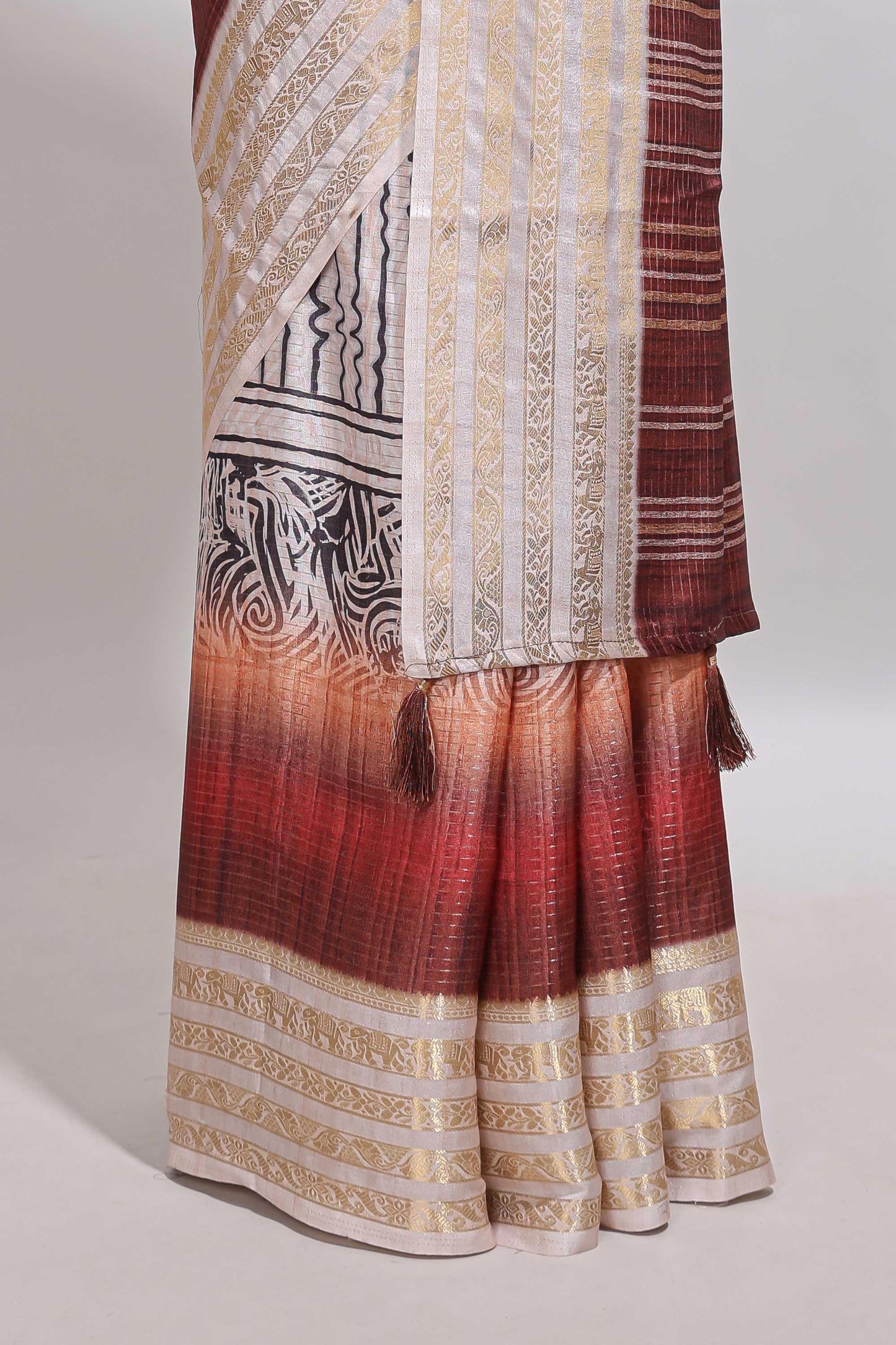 Plum red geometric design dola silk saree with  contrast zari border and matching blouse
