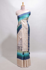 Blue geometric design dola silk saree with contrast zari border and matching blouse