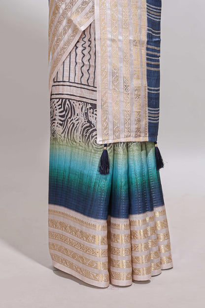 Blue geometric design dola silk saree with contrast zari border and matching blouse