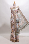 Brown floral design dola silk saree with sellf zari border and matching blouse